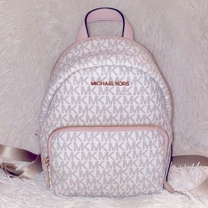 MK medium pink and cream backpack.